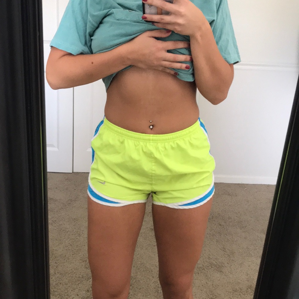 Neon yellow nike running shorts